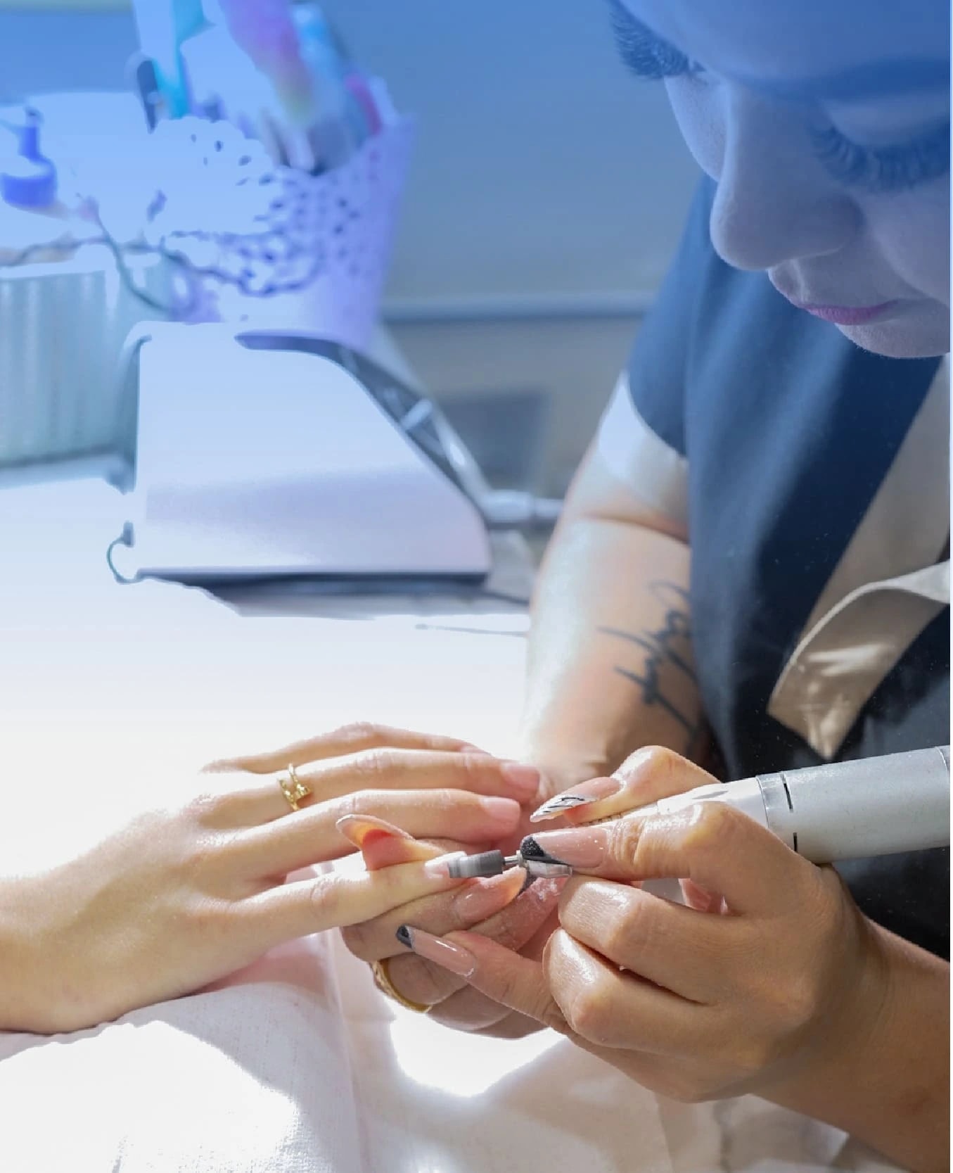 Professional manicure hands representing nail salons that use Weibook